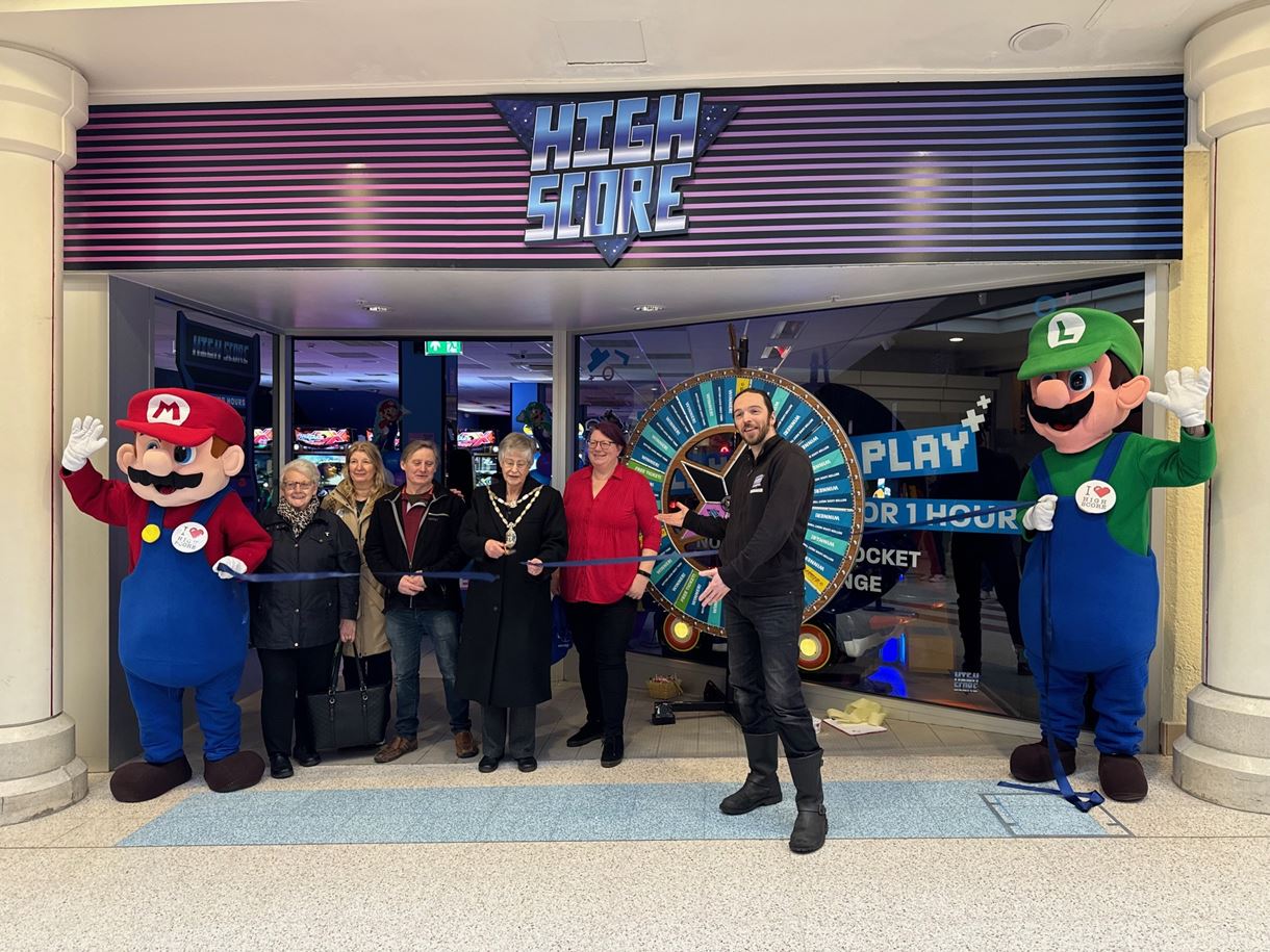 Ribbon cutting at the opening of High Score Arcades